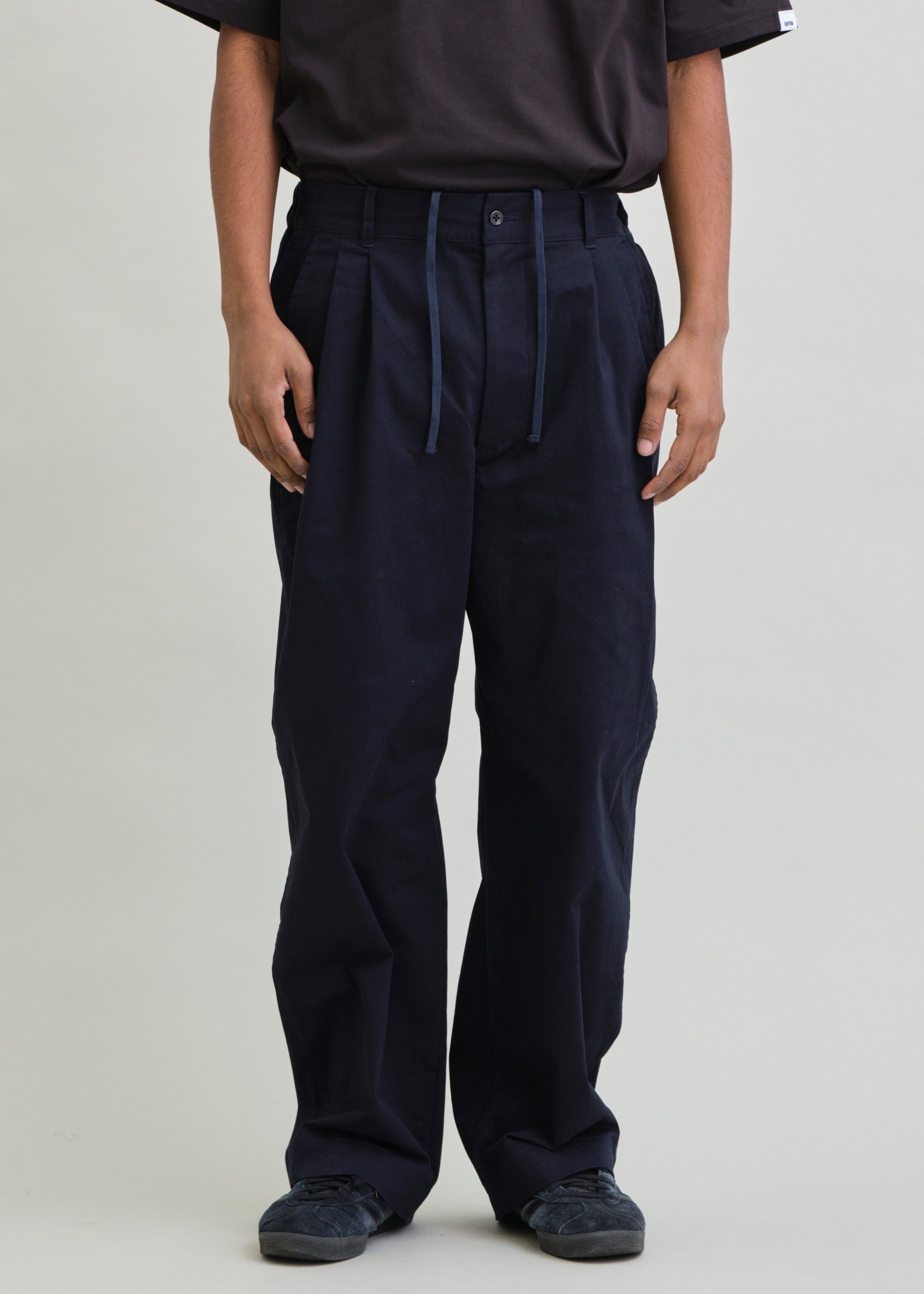 CLASSIC TWO-TUCK WIDE CHINO TROUSERS – UNFRM®️ OUTDOOR STANDARD